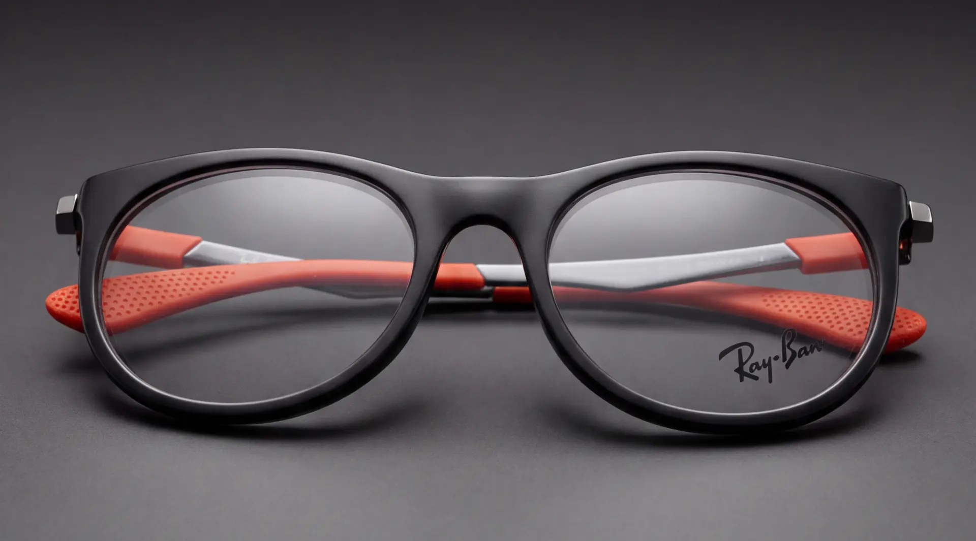 Ramă Ray-Ban Junior pentru copii, negru mat cu brațe portocalii, vedere semi-profil