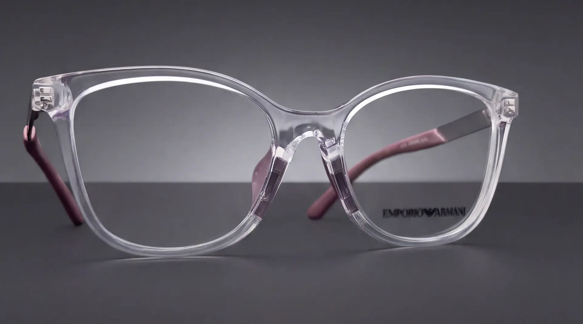 Vedere frontală a ramei Emporio Armani transparente cu brațe roz pentru copii
